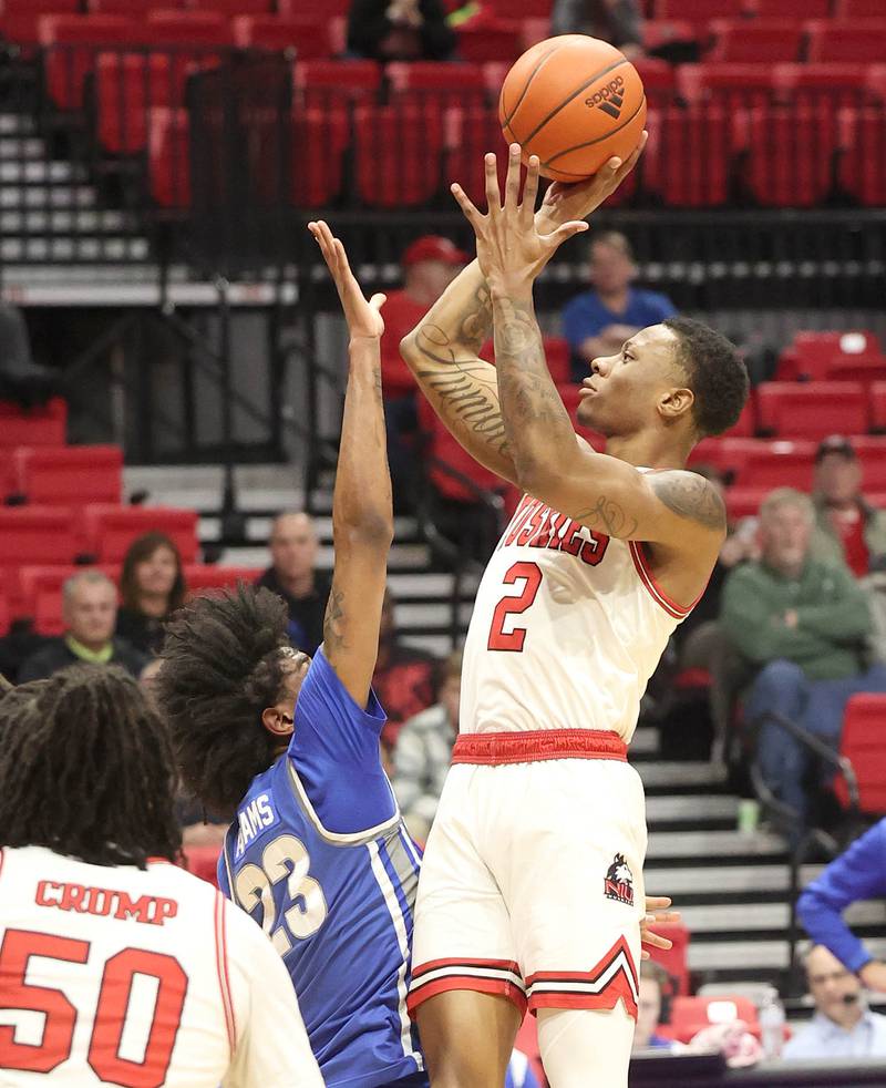 Northern Illinois Huskies guard Zarique Nutter shoots over Buffalo Bulls forward Isaiah Adams Tuesday, Feb. 28, 2023, during their conference matchup at the Convocation Center at NIU.