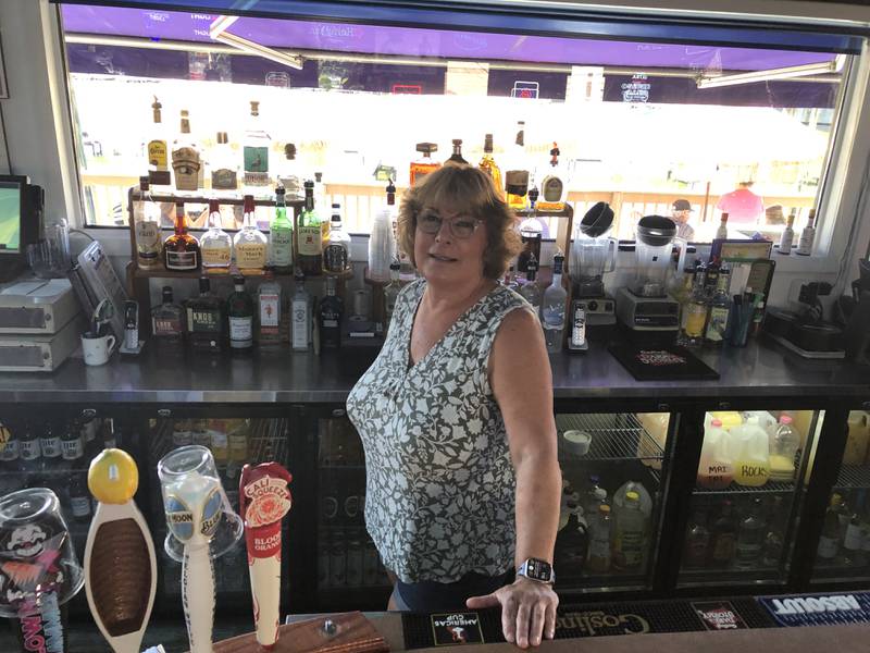 Vickie Clawson stands behind the bar at Vickie's Place, 1211 N River Road, McHenry, on Thursday, Aug. 31, 2023. The restaurant reopened on Aug. 8 after a 7 1/2 month shut down.