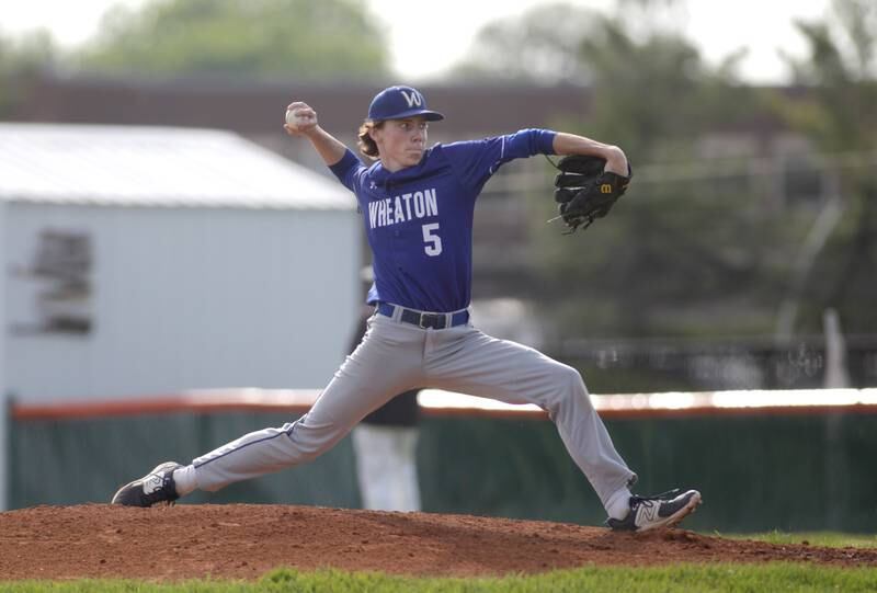 Wheaton North’s Sean Kannegiesser pitches during a game at St. Charles East on Monday, May 15, 2023.