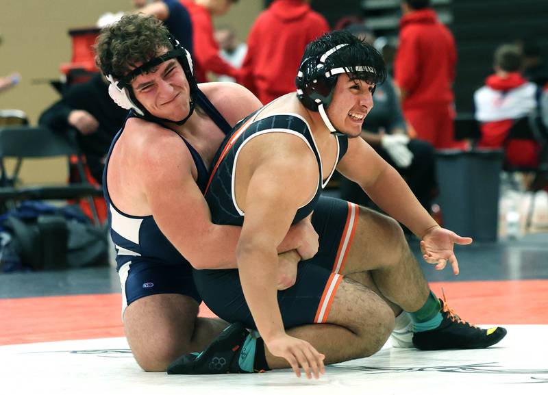DeKalb’s Erick Rivas (right) tries to escape from Lake Park’s Xhevdet Rustemi Wednesday, Nov. 27, 2024, during their 285 pound match at DeKalb High School. Rivas lost his match due to an injury.