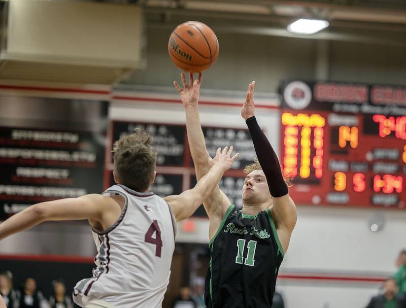Rock Falls’ Gavin Sands puts up a jumper against Rockridge’s Jase Whiteman Wednesday, March 1, 2023 in the Orion 2A sectional semifinal.