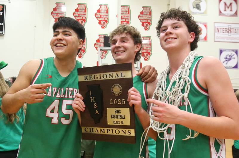 L-P's Andy Medina, Jackson Sellett and Mikey Hartman pose with the Class 3A Regional title plaque after defeating Streator on Friday, Feb. 28, 2025 in Sellett Gymnasium at L-P High School.