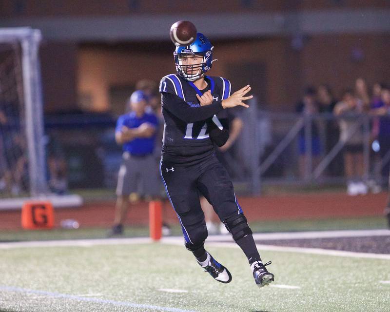 St. Charles North's J.T. Padron makes a throw against Geneva on Sept. 12, 2025 in St. Charles.