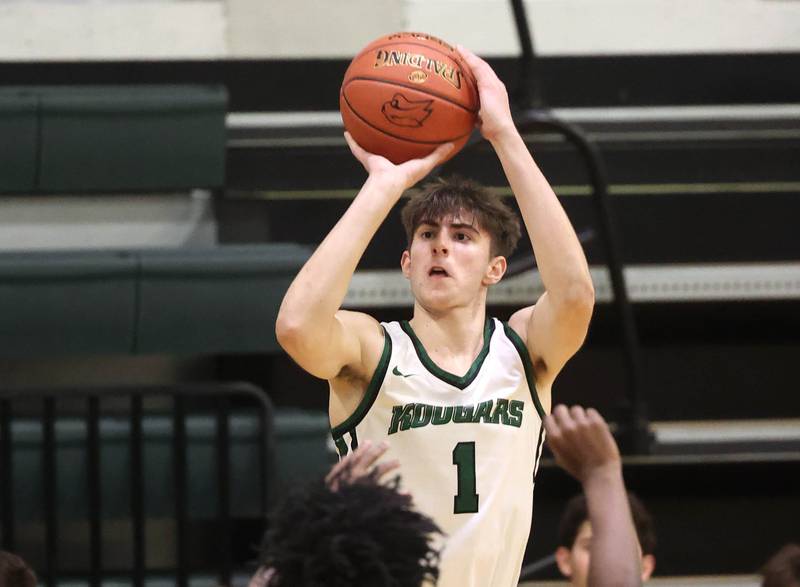 Kishwaukee College's Ben Larry shoots over Rockford University's Ryan Bledsoe-Taylor Thursday, Jan. 22, 2026, during their game at Kishwaukee College in Malta.