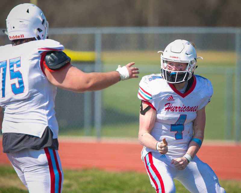 Marian Central quarterback Brendan Hernon celebrates after a touchdown against Carmel on April 3, 2021.