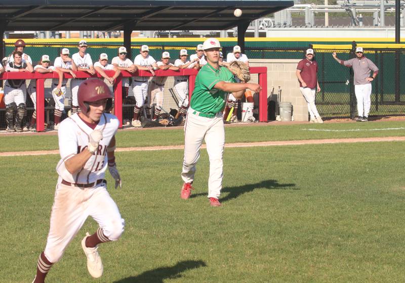 L-P's Brendan Boudreau throws across the infield to force out Morris runner Caston Norris during the Class 3A Regional semifinal game at Huby Sarver Field in La Salle.