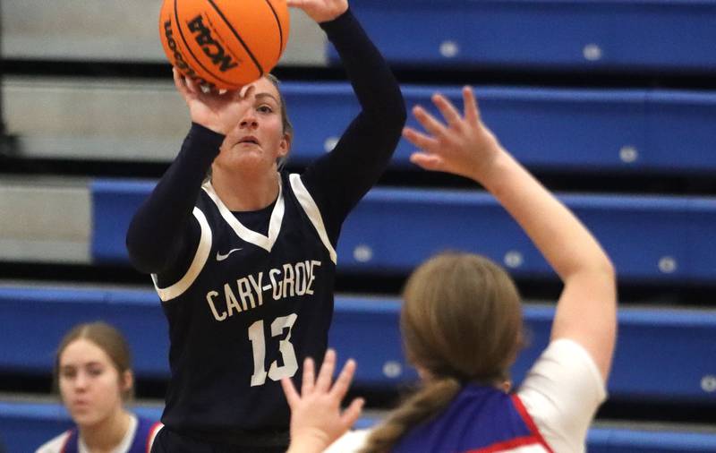 Cary-Grove’s Malaina Kurth takes an outside shot against Lakes in varsity girls basketball action on Friday, Jan. 2, 2026  at Lakes High School in Lake Villa.