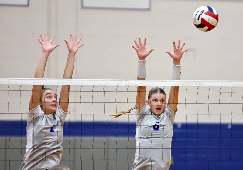 Princeton's Kathy Maciczek (7) and Caroline Keutzer (6) team up for a block in Tuesday's match against Kewanee at Prouty Gym. The Tigresses won 25-8, 25-22.