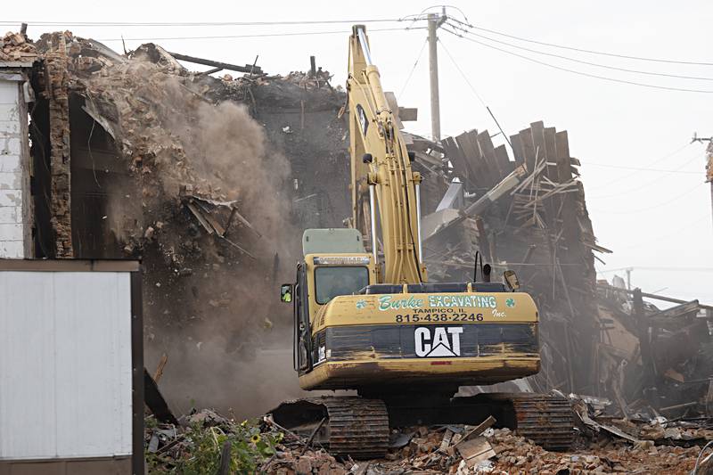 Some of the material will be used to fill in the basement before being covered with soil and seeded per city request.