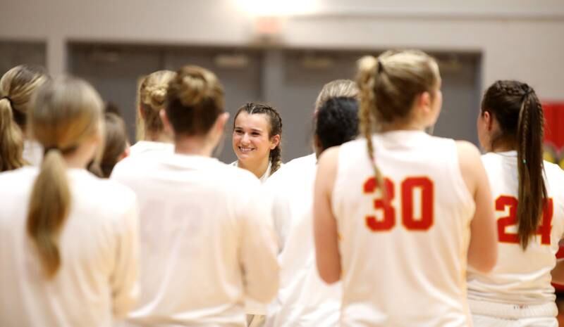Batavia’s Brooke Carlson celebrates breaking the school’s all-time points scored during a game against St. Charles East at Batavia on Thursday, Feb. 1, 2024.