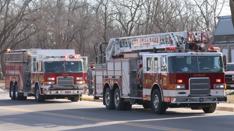 Utica and La Salle firefighters respond to the Fire On Fifth entrance in the Westclox building on Tuesday, Jan. 20, 2026 in Peru. A working fire started in the storage room inside of Fire on Fifth. The fire started at 10a.m.  Fire departments from Utica, Oglesby Peru and La Salle all assisted on the scene. La Salle and Peru EMS were also dispatched. The entire Westclox building was evacuated. Two employees were transported by ambulance for smoke inhalation. A smoke detector inside Star Union Spirits triggered an alarm, prompting a fast response from firefighters.