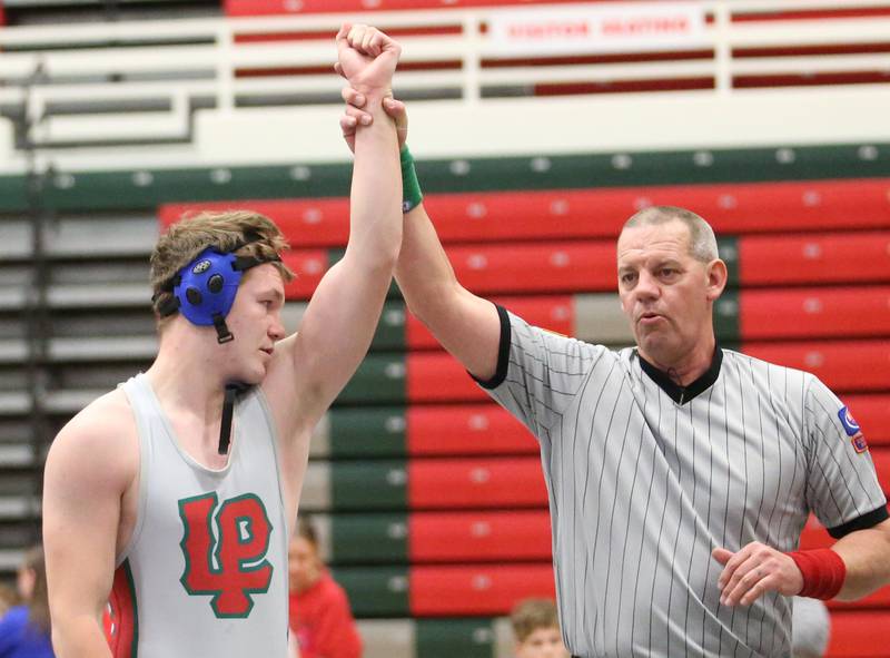 L-P's Caedan Small wins a match against United Township during a meet on Wednesday, Dec. 13, 2023 in Sellett Gymnasium at L-P High School.