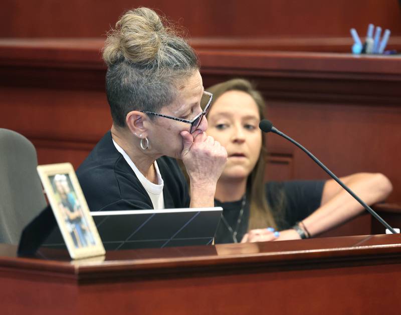 Diane Caporaso, mother of Christina Musil, weeps as she gives her victims impact statement Tuesday, Aug. 26, 2025, during the sentencing hearing for Nathan P. Sweeney at the DeKalb County Courthouse in Sycamore. Sweeney received 14 years in prison for driving under the influence and causing the 2024 crash that killed sheriff’s deputy, veteran and mother Musil.