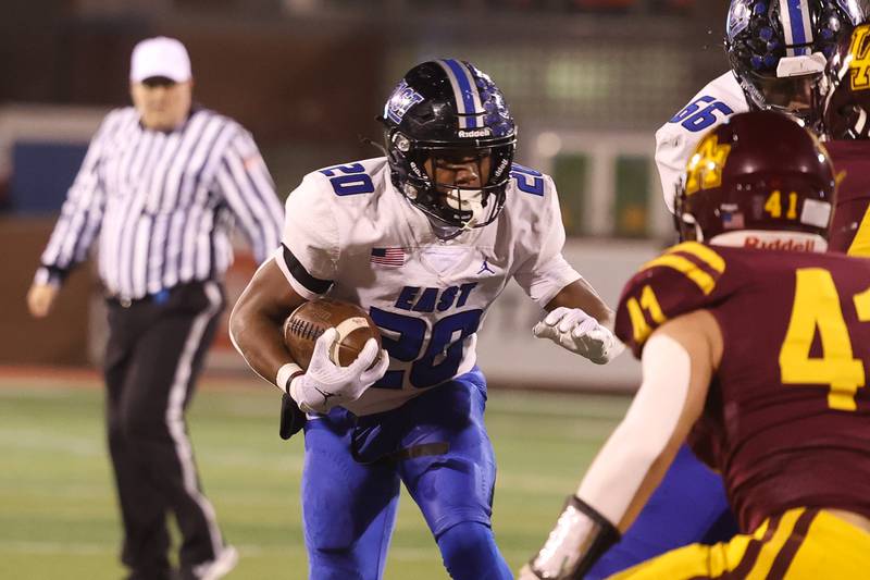 Lincoln-Way East’s Zion Gist rushes against Loyola in the Class 8A championship on Saturday, Nov. 25, 2023 at Hancock Stadium in Normal.
