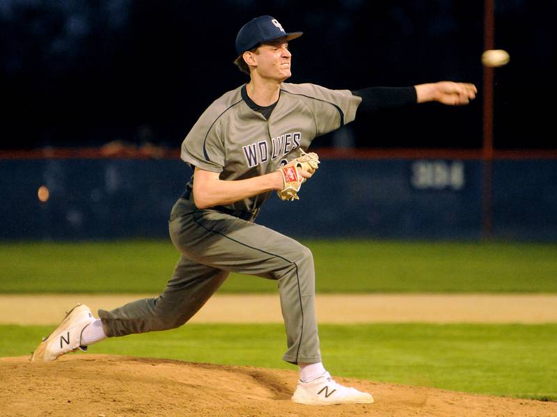 Oswego East's Noah Schultz fires a throw to an Oswego batter during a varsity boys baseball game on Thursday, May12, 2022 at Oswego High School.