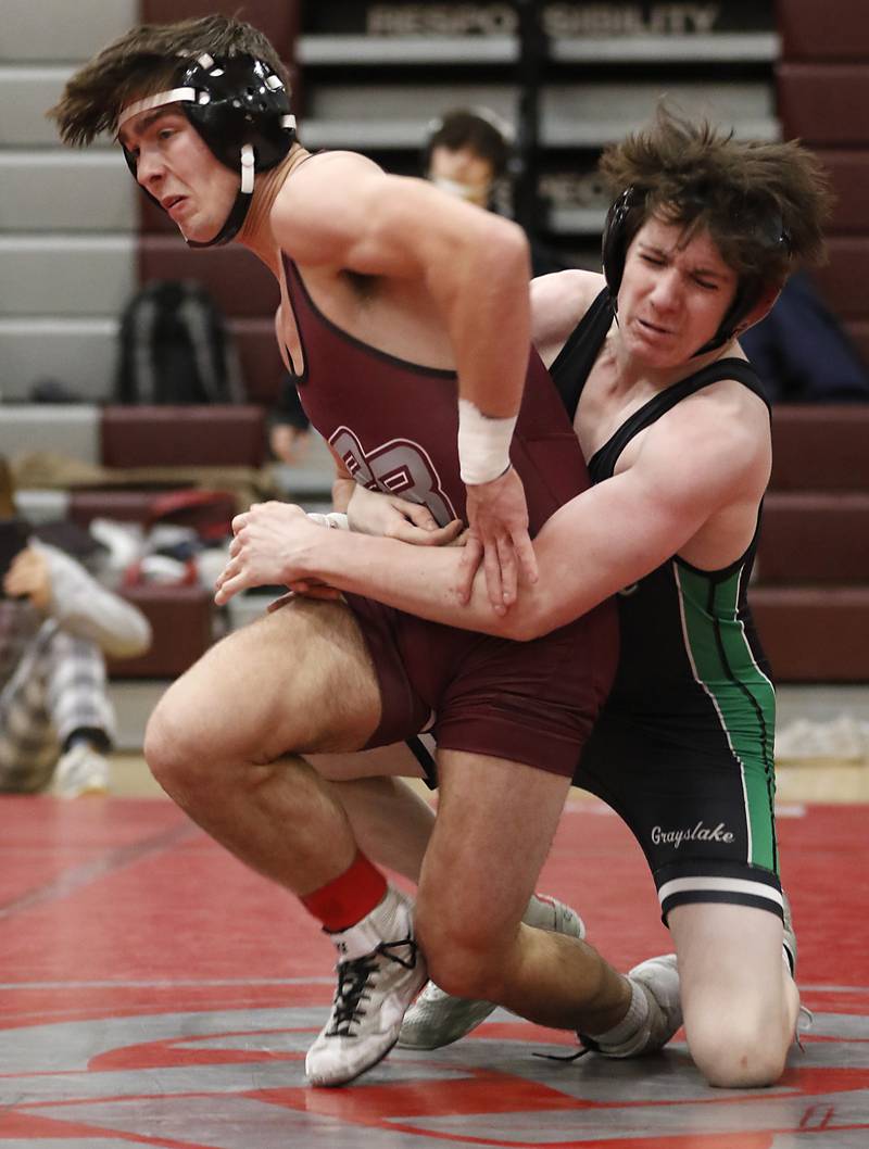 Prairie Ridge’s Mikey Meade escapes the grasp of Grayslake Central’s Kyle Christophersen in a 126-pound match of the IHSA 2A Antioch Wrestling Regional on Saturday, Feb. 8, 2025, at Antioch High School.