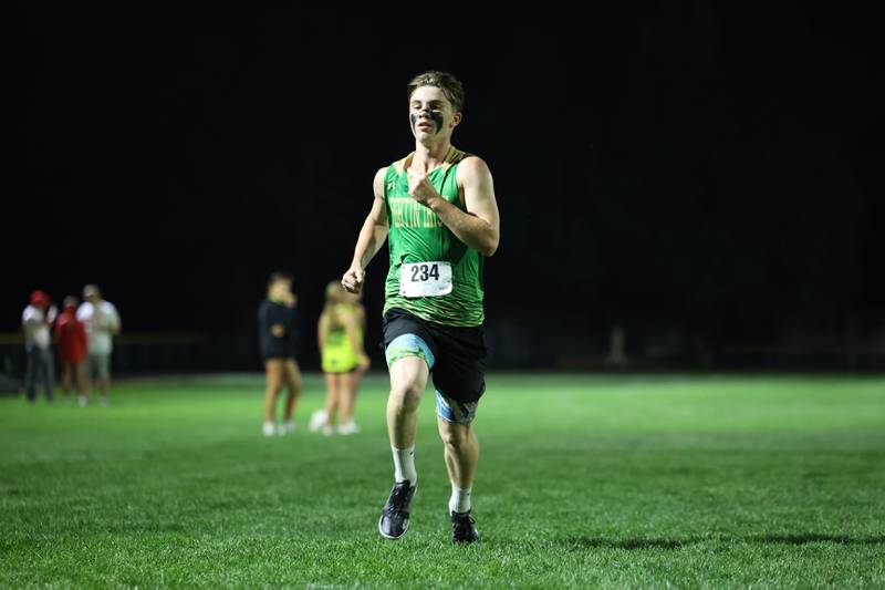 Bishop McNamara's Jayden Lewis nears the finish line during the All-City cross country meet at Bishop McNamara on Wednesday, Sept. 17, 2025.