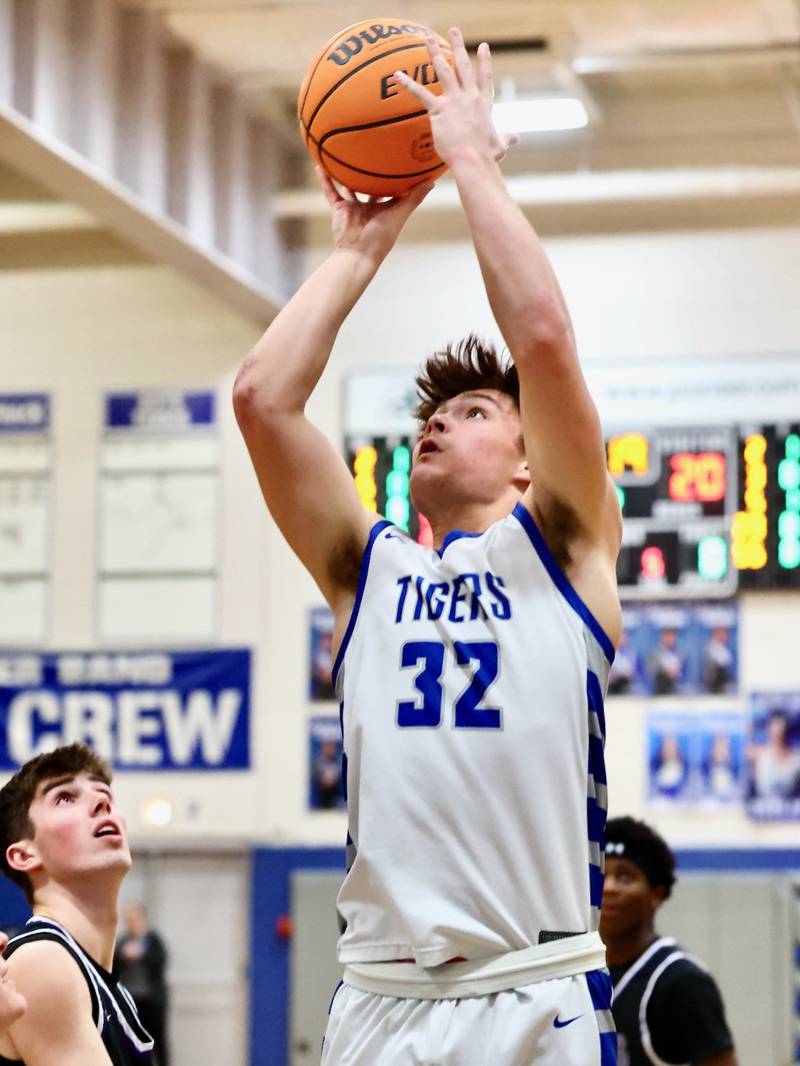 Princeton senior Owen Hartman shoots against El Paso-Gridley Tuesday night at Prouty Gym. The Titans defeated the Tigers 75-59.