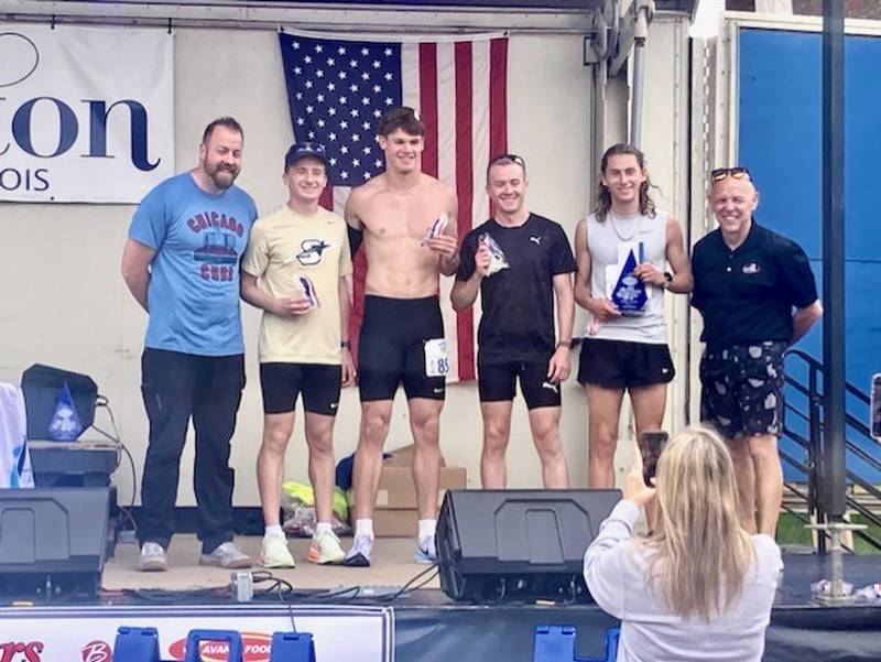 There were four male runners in the elite division for Princeton Mile Race Saturday - Brock Loftus (from left) of Ohio, Elijah House of Sheffield, Colin Mickow of Oswego and and race winner Jake Gullam of Metamora with a time of 4:08.