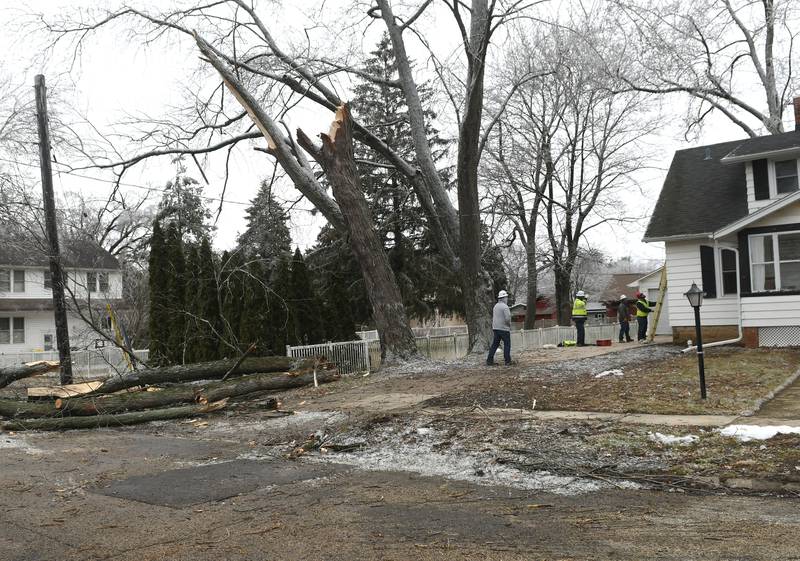 ComEd workers responded to outages across portions of Ogle County on Thursday following freezing rain on Wednesday. The ice storm, coupled with strong winds, caused electrical outages across the area. Here, a crew works on restoring power to a Mt. Morris home on N. Reynolds Street.