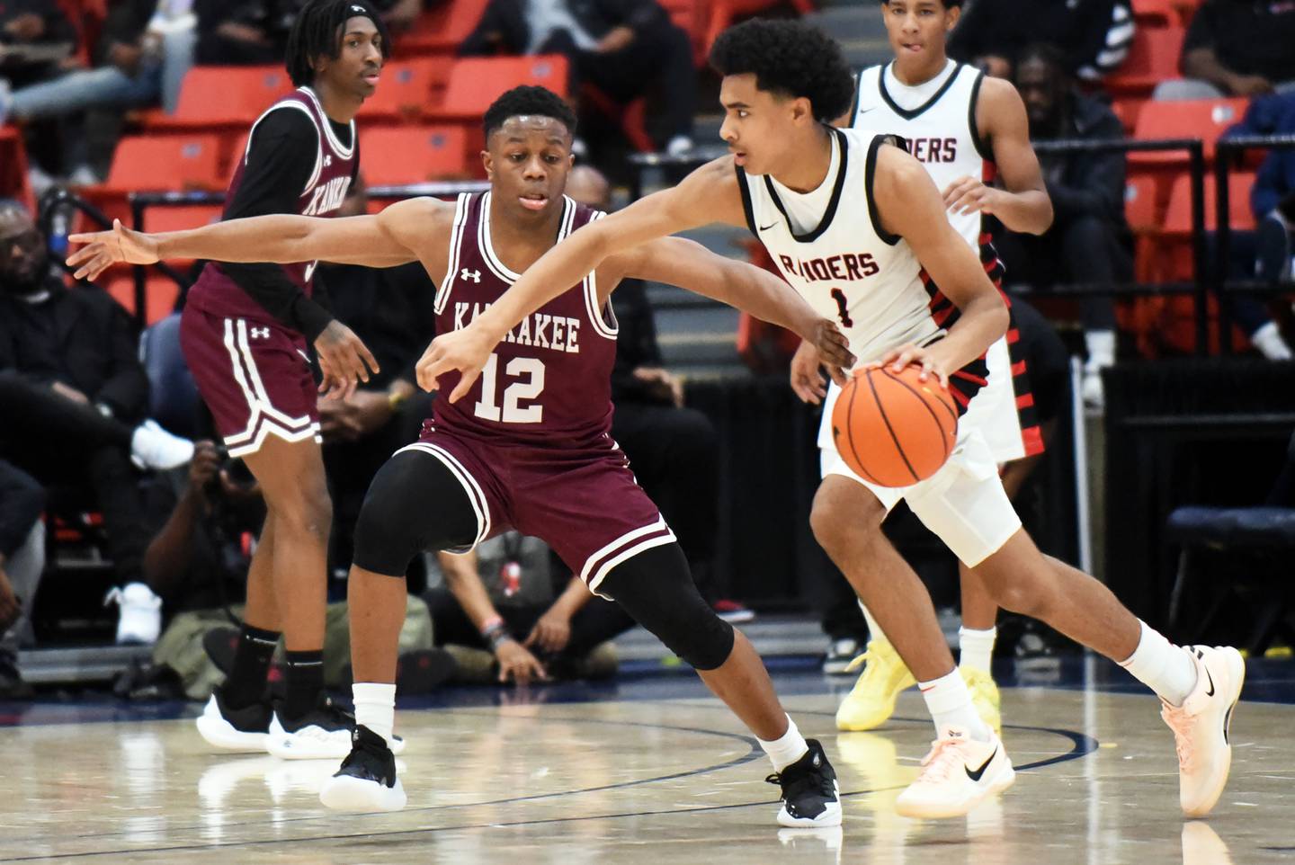 Bolingbrook's Braden Pettigrew, right, looks for a way around Kankakee's Myair Thompson during Saturday's Chicago Elite Classic game at University of Illinois-Chicago's Credit Union 1 Arena.