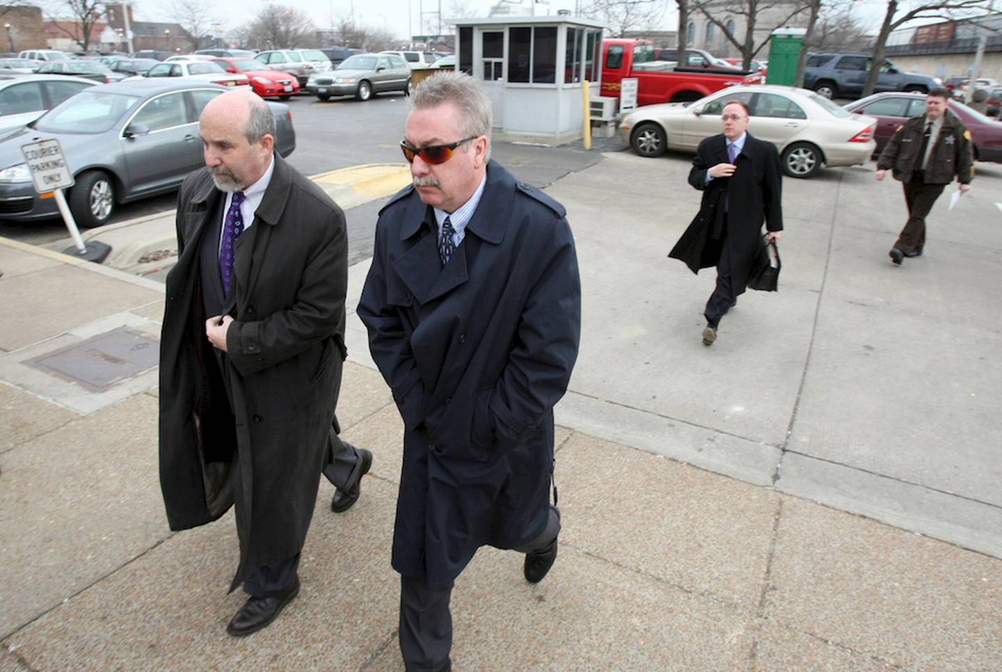 Shaw Media File Photo

Drew Peterson enters the Will County Courthouse in Joliet on March, 17 2008  with his lawyer Joel Brodsky (left) for a hearing regarding the return of some of his belonging that were confiscated by police.