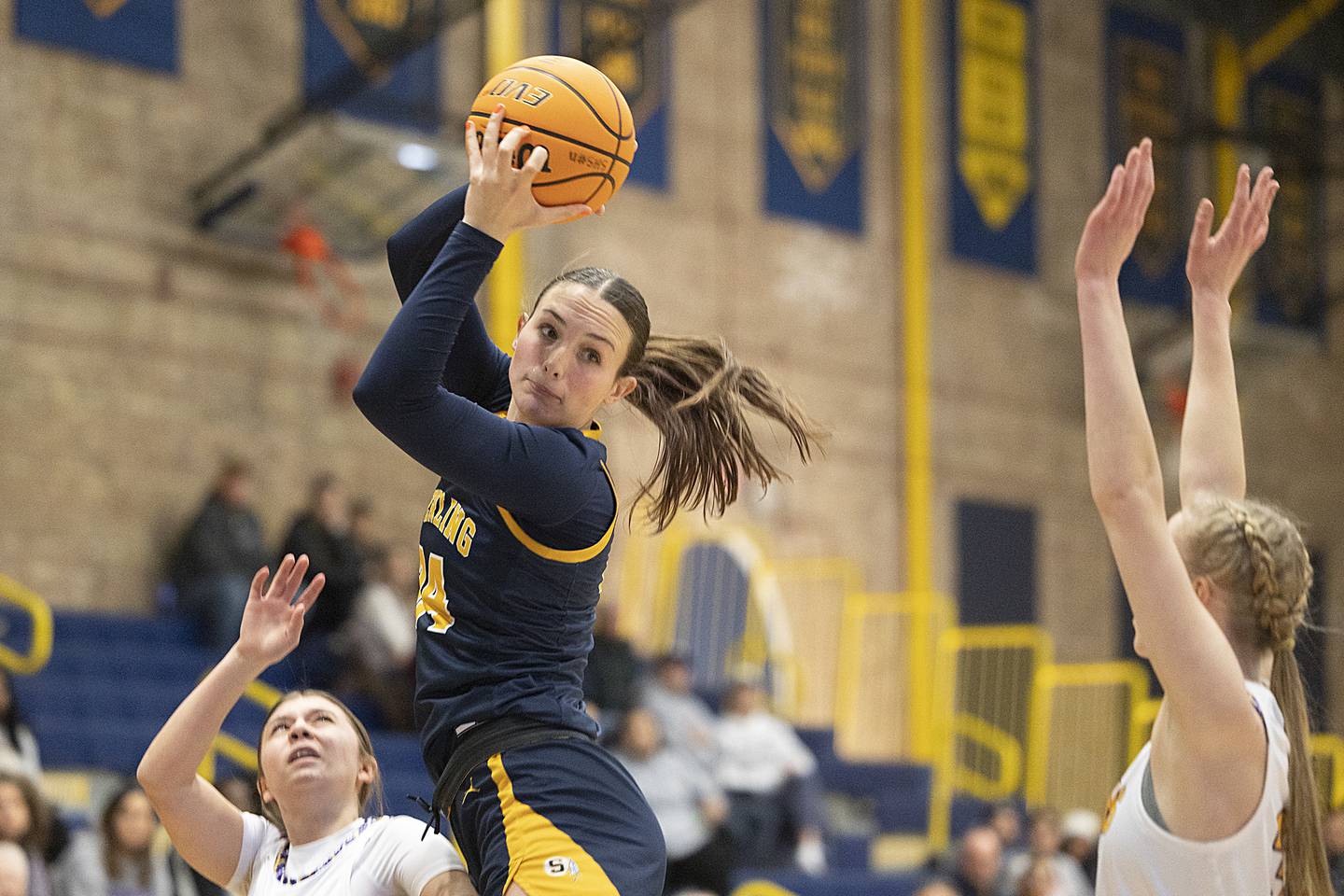 Sterling’s Madison Austin pull down a rebound against Hononegah Saturday, Dec. 21, 2024, during the Sterling Shootout.