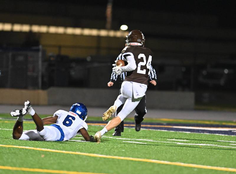 Joliet Catholic's Kivlin Van Tassel (24) catches a pass for a touchdown in the first quarter during IHSA Class 4A first round playoff on Friday, Oct. 28, 2022, at Joliet. (Dean Reid for Shaw Media)