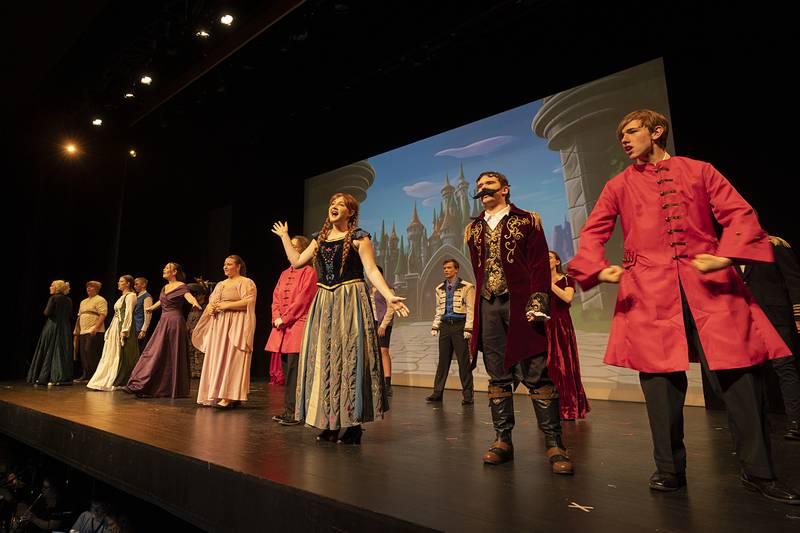 The cast of Newman’s rendition of “Frozen” rehearse a scene Wednesday, April 15, 2026, ahead of this weekend’s performances. Show dates will be April 17 and 18 at 7pm and April 19 at 2pm at Centennial Auditorium on the campus of Sterling High School.