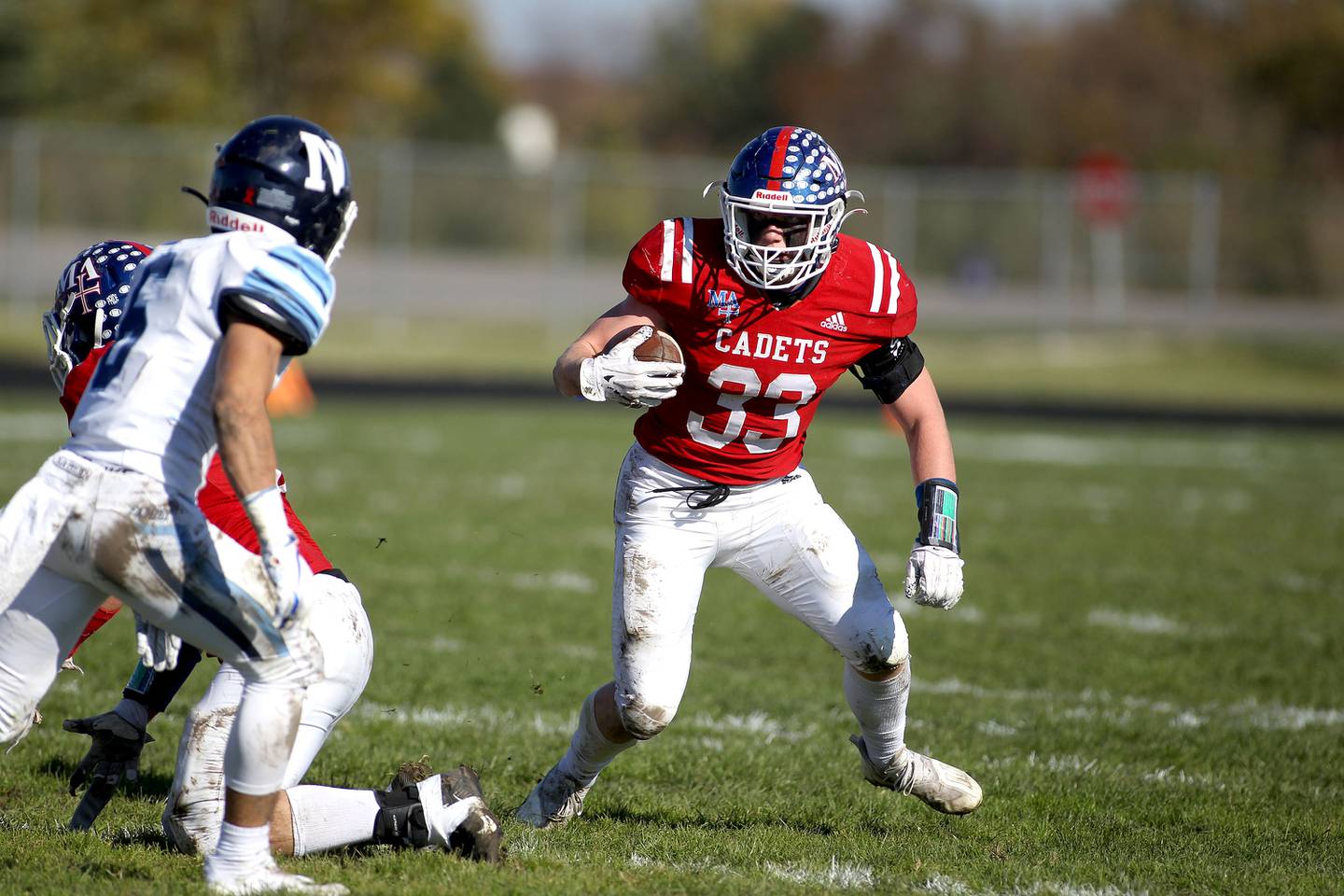 Marmion's Jacob Bottarini (33) carries the ball during a Class 5A second-round game against Nazareth Academy in Aurora on Saturday, Nov. 6, 2021.