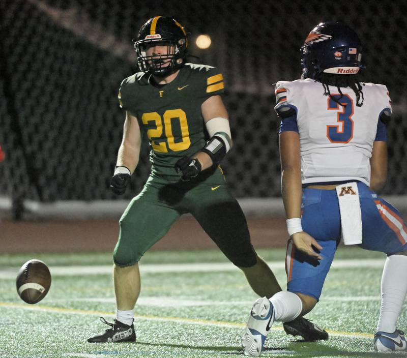 Fremd’s Will Klimas celebrates a sack of Hoffman Estates’ quarterback Nate Cleveland in a football game in Palatine on Friday, Sept. 27, 2024.