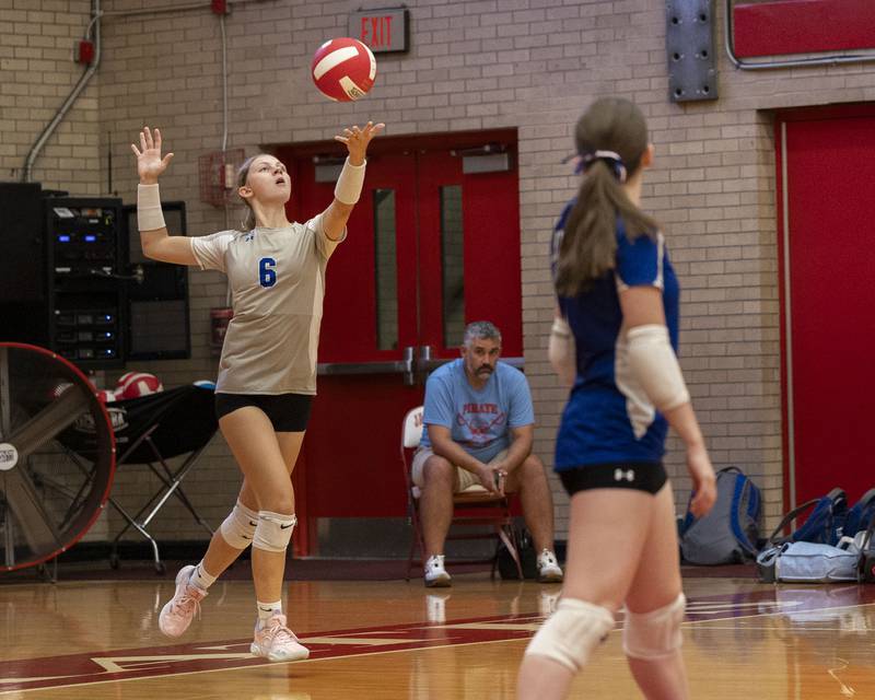 Caroline Keutzer (2) of Princeton serves volleyball on Thursday, Sept. 18, 2025 at Ottawa High School in Ottawa.