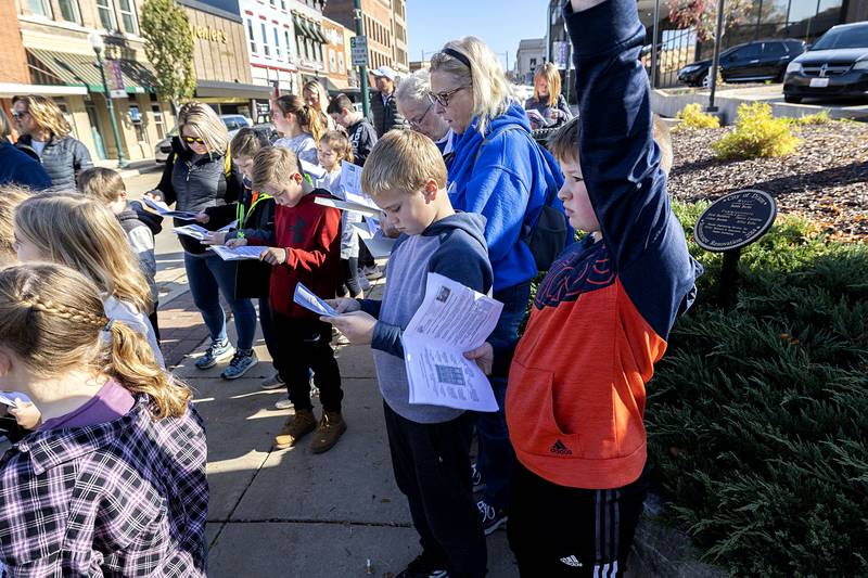 Bethany Callison’s Faith Christian fourth grade class answers questions Tuesday Nov. 1, 2022 during the annual architecture and history tour of downtown Dixon. Fourth graders all over Dixon take the tour to learn about the city’s roots.