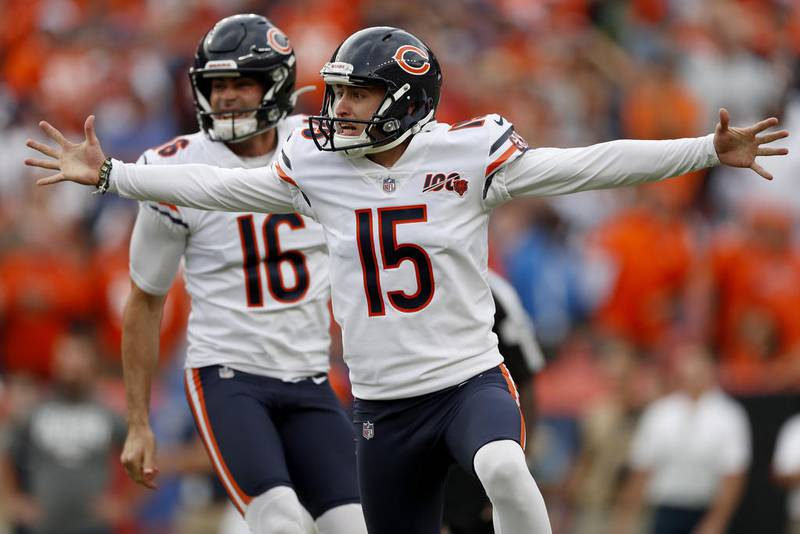 Bears kicker Eddy Pineiro (front) celebrates his game-winning field goal against the Denver Broncos on Sept. 15 in Denver. The Bears won, 16-14.
