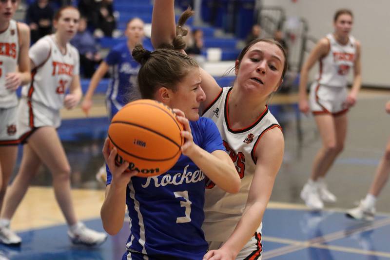Burlington Central’s Julia Scheuer, left, looks for an option as Crystal Lake Central’s Sammi Pottorff defends in IHSA Class 3A Regional Title Game girls basketball action on Thursday, Feb. 20, 2025, at  Central High School in Burlington.