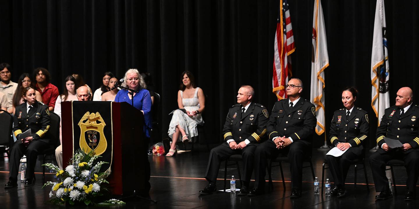Debbie Wiseman, past president of Illinois Concerns of Police Survivors, speaks during the Elgin Police Departments annual memorial service at the Hemmens Cultural Center Thursday.