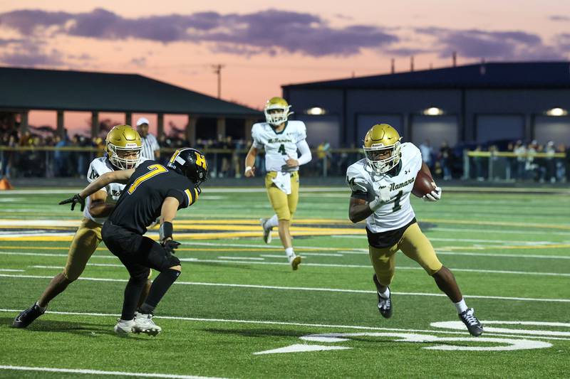 Bishop McNamara's Malachai Lee runs the ball during the Fightin' Irish's 45-28 victory over Herscher on Friday, Sept. 5, 2025.