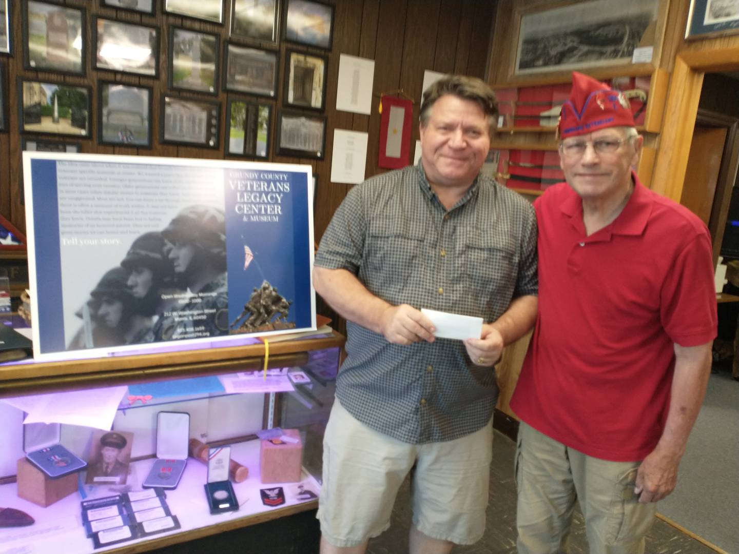 The Veterans Legacy Center and Museum received a donation from the 40&8 Voiture 1195. Museum director Carter Corsello was presented a check by Mike Ebert of the 40&8.