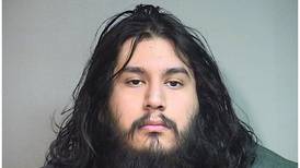 Harvard man accused of punching at police while possessing rifle gets 15-year prison term