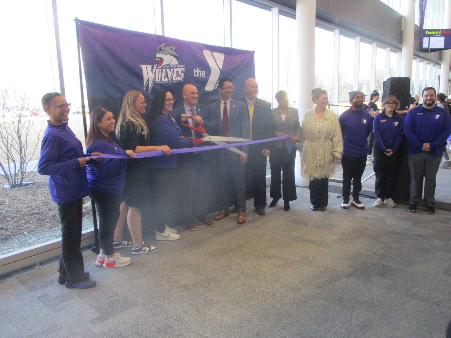 A ribbon is cut Thursday at the Joliet Junior College Event Center to mark the start of a new partnership with the Greater Joliet Area YMCA. Feb. 6, 2025
