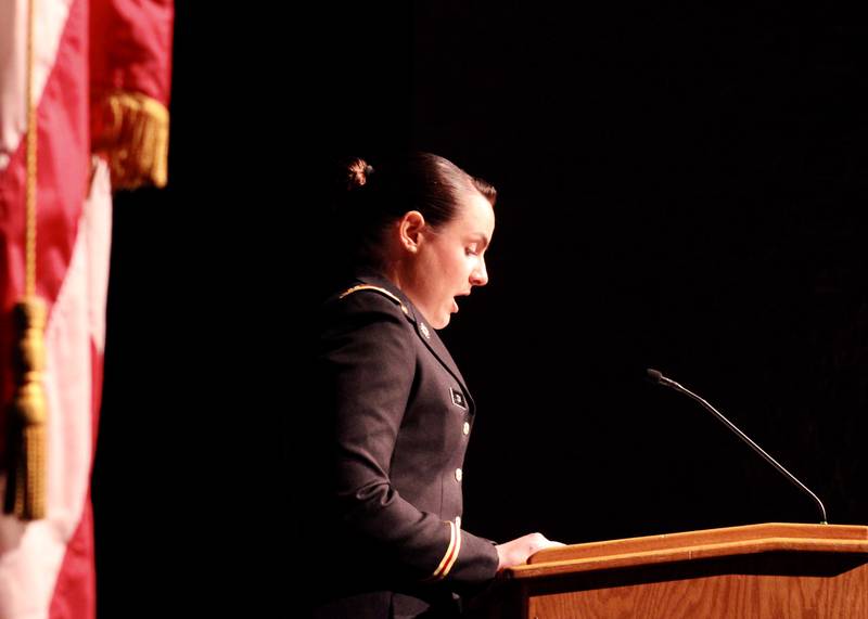 U.S. Army Capt. Taylor J-Beebe Cox, formerly commander of the 52nd Ordinance Company in Korea, spoke about the resiliency required and the reward of belonging that accompanies military service during her Veterans Day address on Thursday, Nov. 11, 2021, at Sterling High School's Centennial Auditorium.