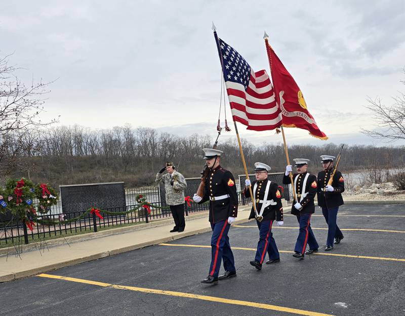The Color Guard presents the flags Saturday, Dec. 14, 2024, at the Middle East Conflict Wall in Marseilles during a Wreaths Across America ceremony.