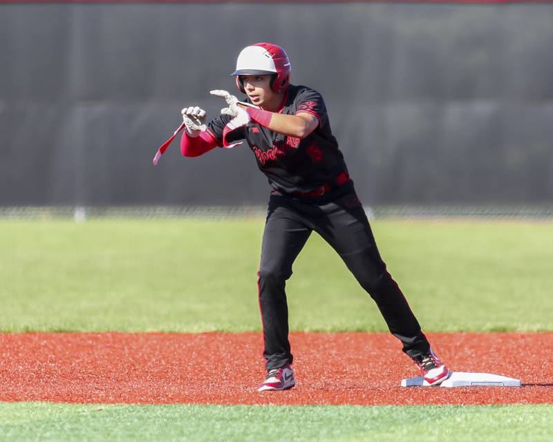 Yorkville's Nick Parashis (5) gestures to the dugout after pulling up to second with a double during baseball game between Oswego at Yorkville. Thursday, May 8, 2025 in Yorkville.