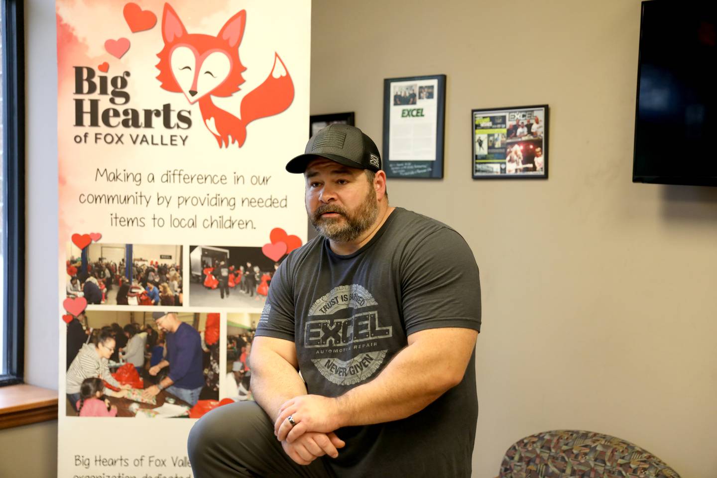 United States Marine Corps veteran Minor Mobley owns Excel Automotive Repair in St. Charles and co-founded Big Hearts Fox Valley with his wife, Jennifer.