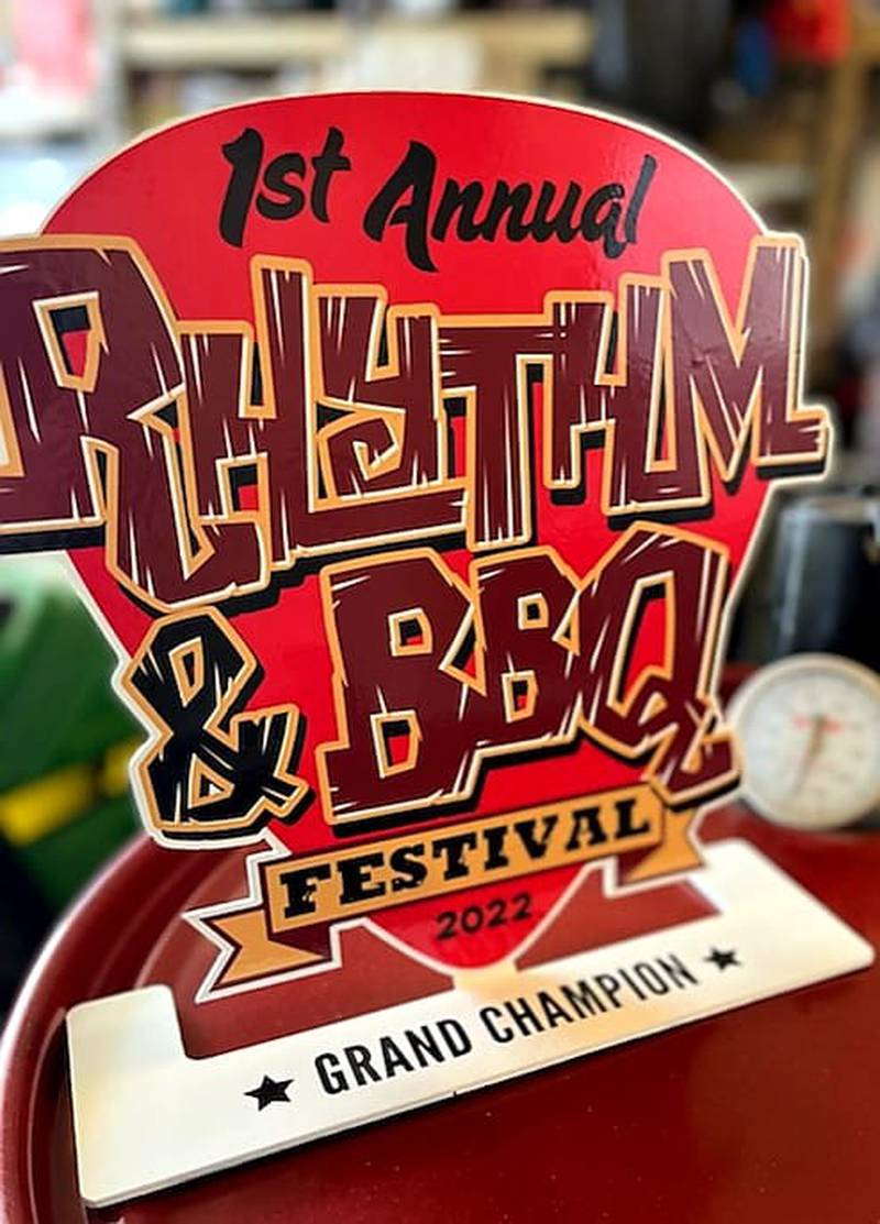 The Grand Champion of the Rhythm and BBQ Festival will win $500 and take home the pictured trophy.