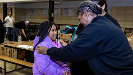 Elementary students in Joliet receive free winter coats courtesy of Nicor 