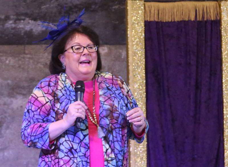 Julia Messina executive director of North Central Illinois artworks delivers a speech during the 7th annual Mad Hatter Ball on Friday, Nov. 17, 2023 at the Westclox Event Center in Peru.