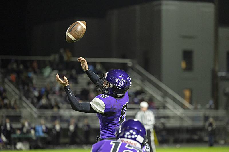 A pass tips off the hands of Dixon’s Tyson Dambman in a first round playoff game against Plano Friday, Oct. 27, 2023 in Dixon.