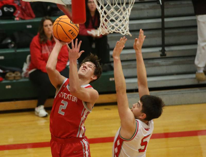 Streator's Matt Williamson drives to the hoop as L-P's Erick Sotelo defends on Tuesday, Jan. 14, 2025 in Sellett Gymnasium at L-P High School.