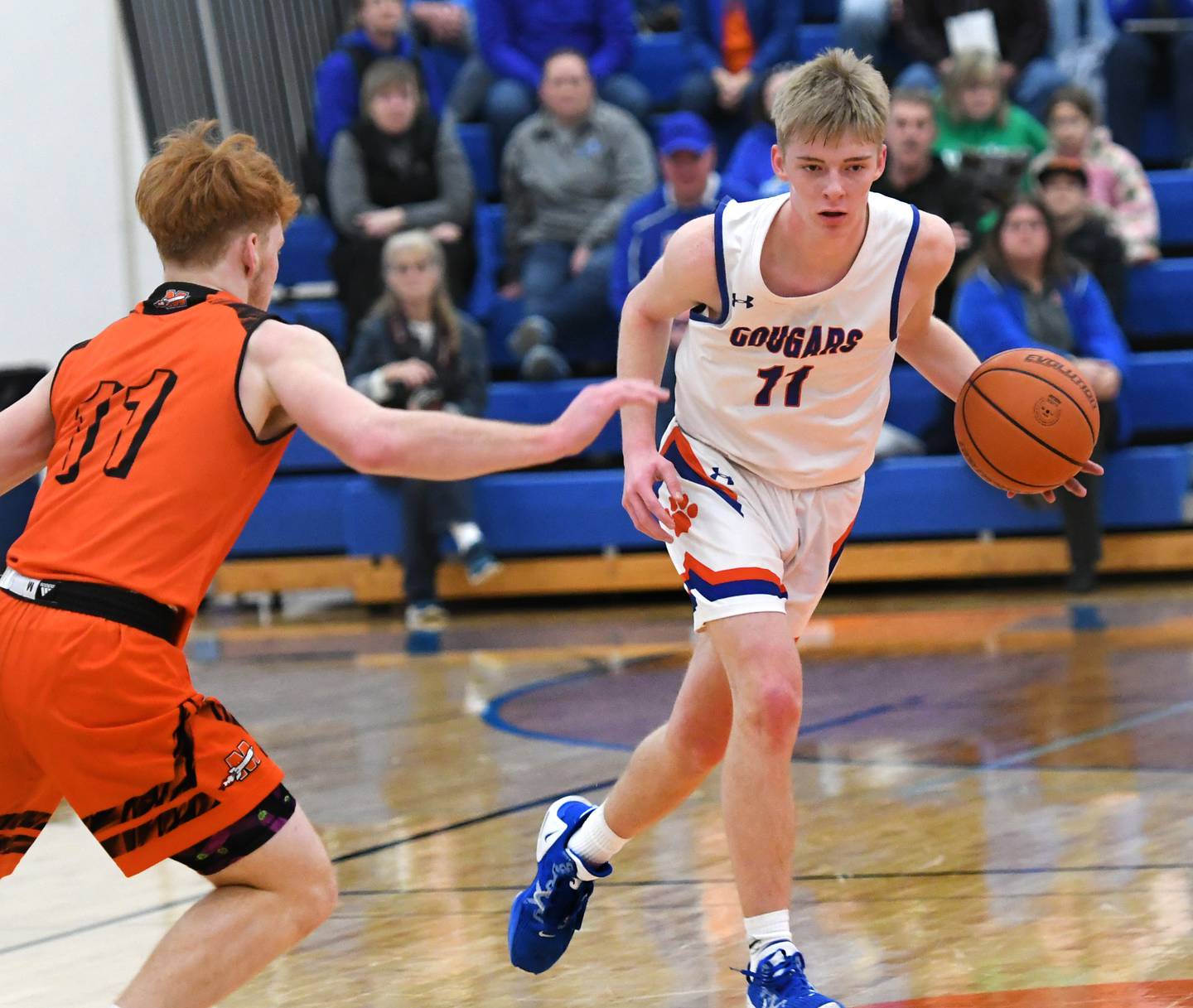 Eastland's Trevor Janssen (11) dribbles as Milledgeville's Connor Nye defends during 1A regional action in Lanark on Saturday.